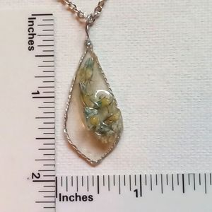 Floral necklace, amulet